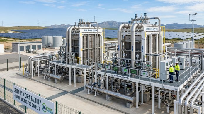maruti_manesar_green_hydrogen_electrolyzer_1790257978 Industrial green hydrogen electrolyzer facility with solar power coupling